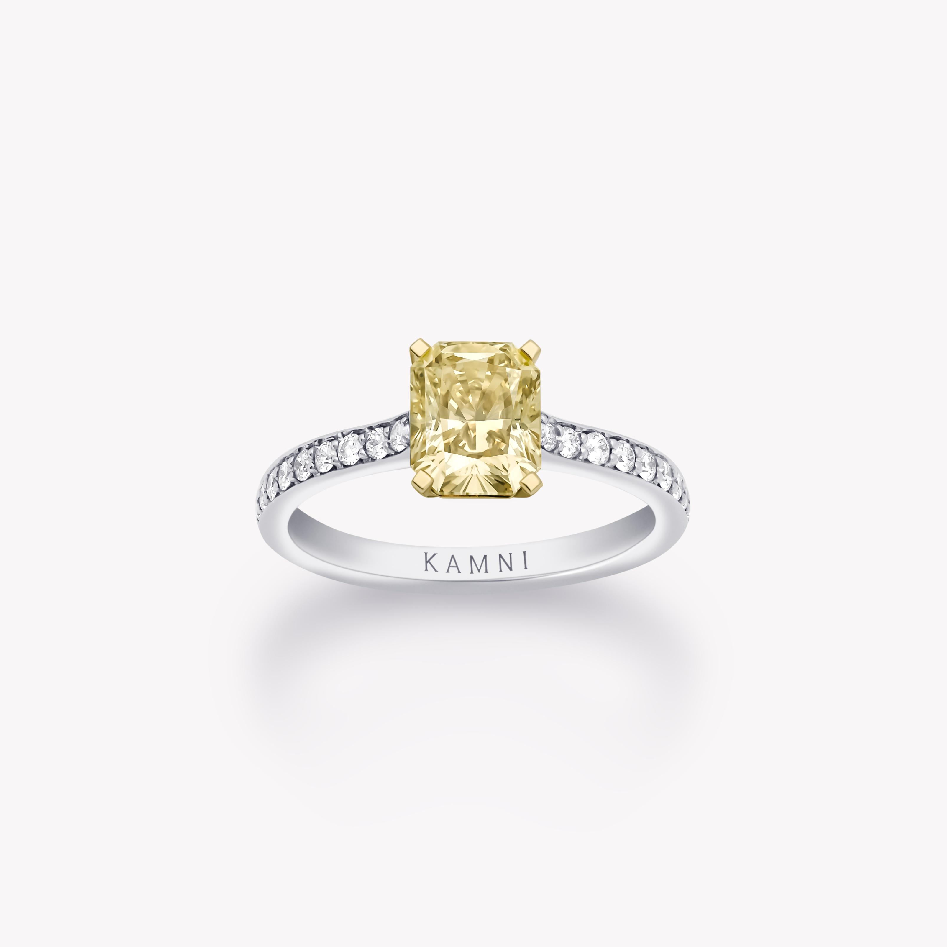 Fancy light yellow radiant diamond ring 