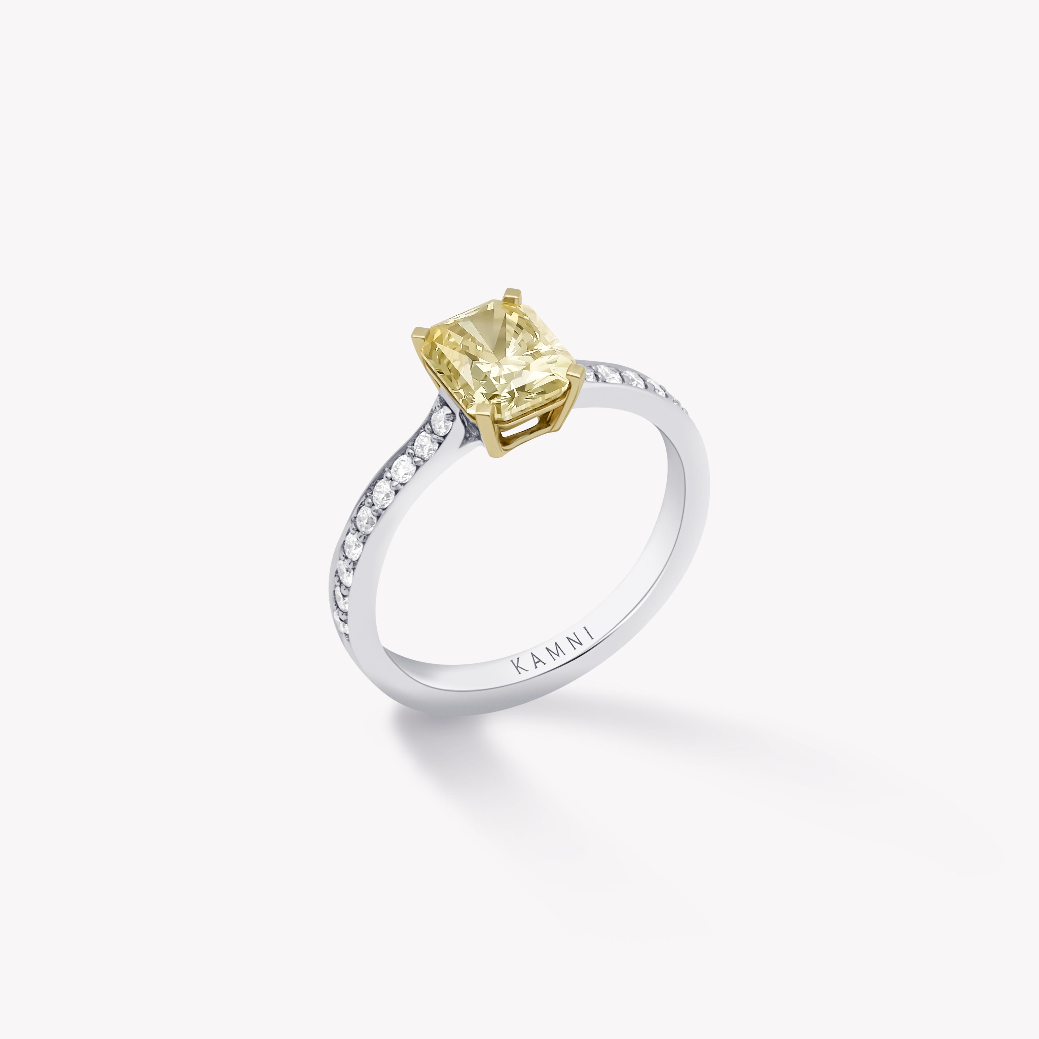 Fancy light yellow radiant diamond ring 